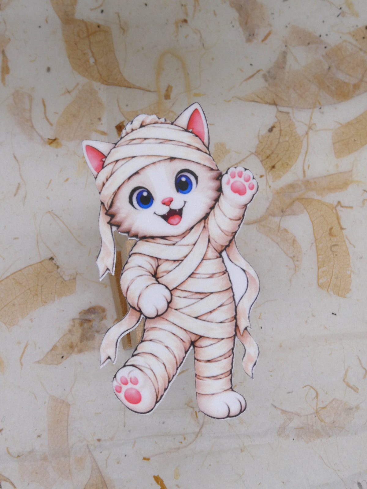 Mummy Bobcat Halloween sticker - kitten wrapped in mummy bandages