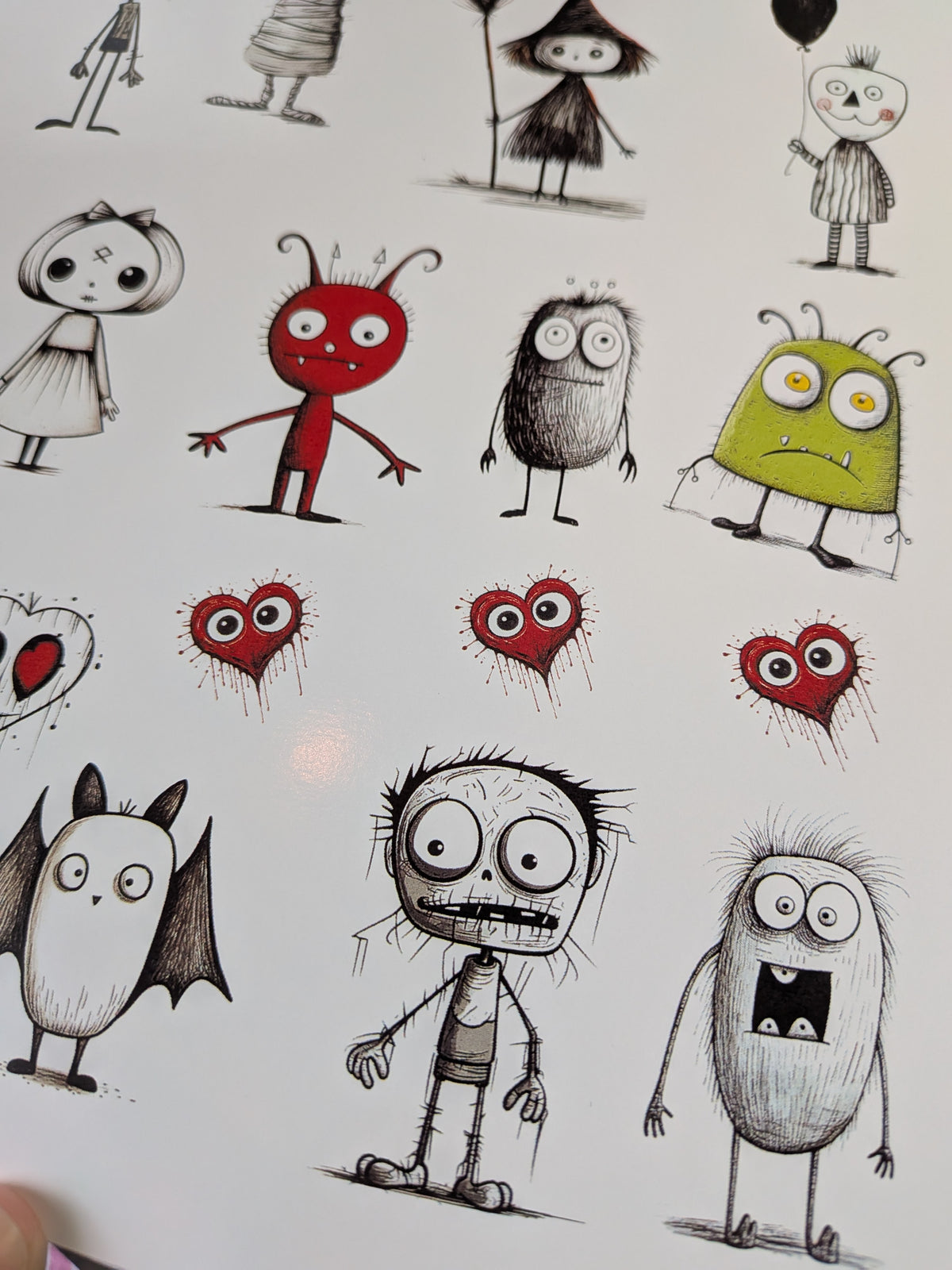 Red monster, green monster and spooky heart sketched Halloween stickers