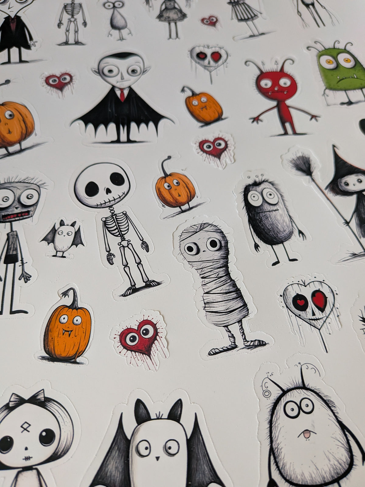 Printed sheet of sketched Halloween character stickers