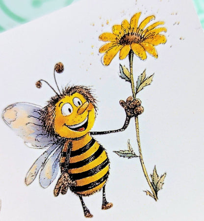 Happy cartoon bee holding a daisy printed waterslide decal
