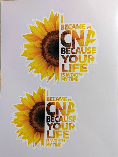 Printed and cut iron-on transfer sheet with two sunflower CNA designs, ready to apply at home