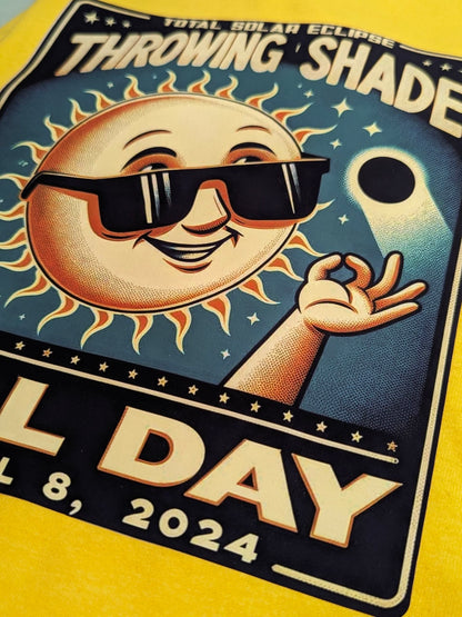 Custom iron-on transfer of a retro sun wearing sunglasses ironed onto a yellow t-shirt