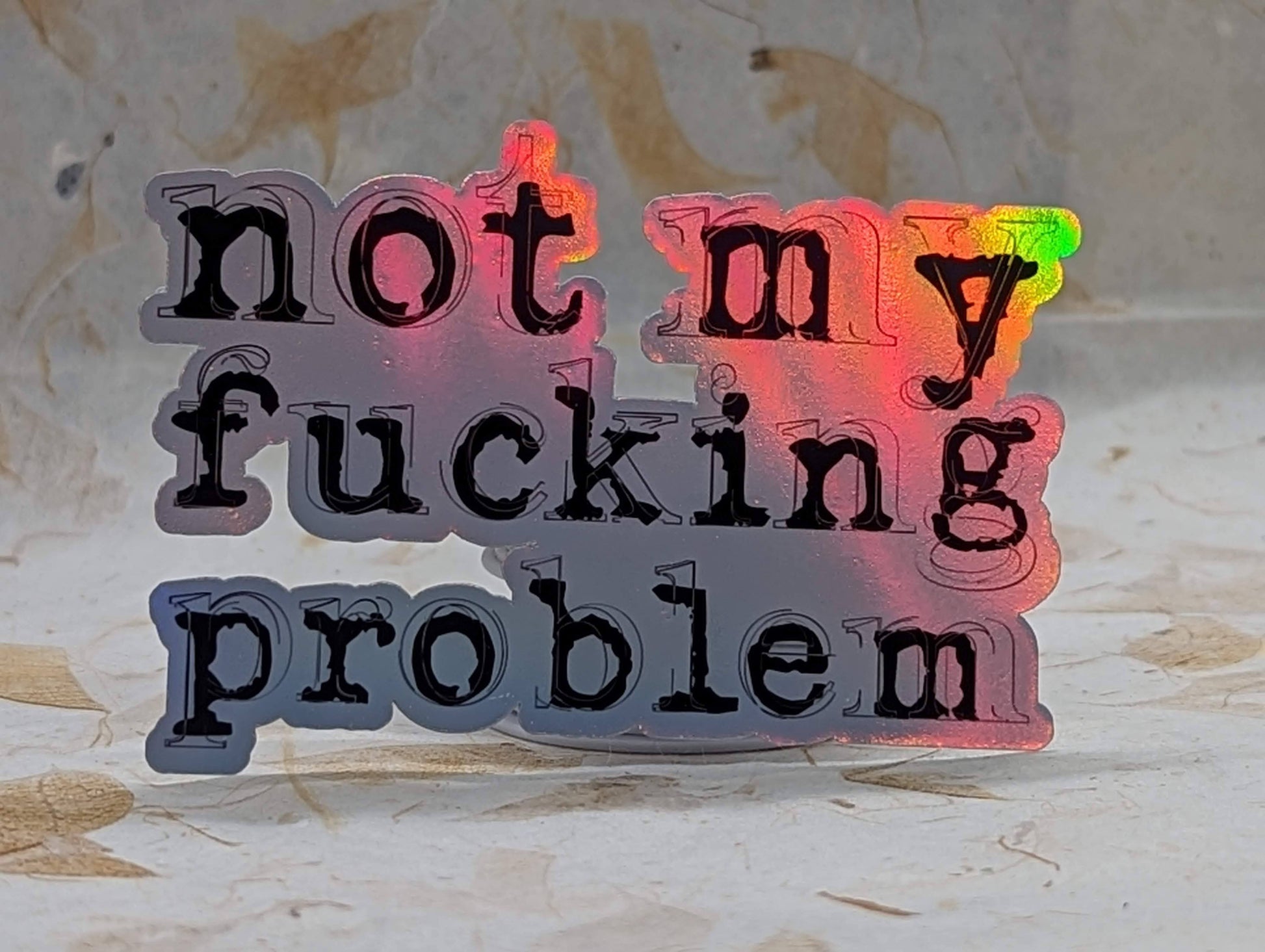 Not My Fucking Problem adult humor vinyl sticker with holographic shimmer - SoCuteINeedOneToo