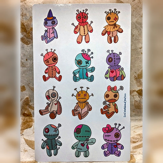 Half sheet of 12 pastel patchwork voodoo doll stickers, real product photo